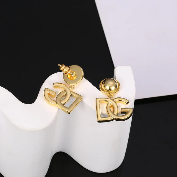 Brincos DG com 18 K de Ouro Amarelo - DG