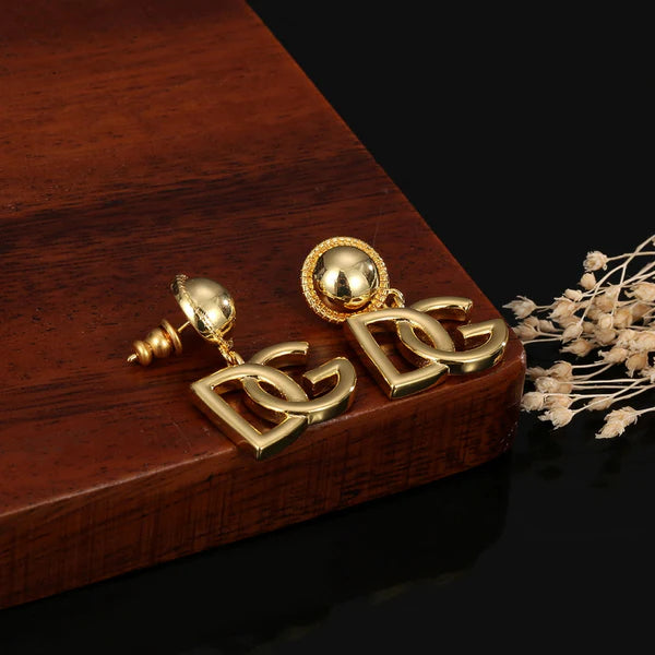 Brincos DG com 18 K de Ouro Amarelo - DG