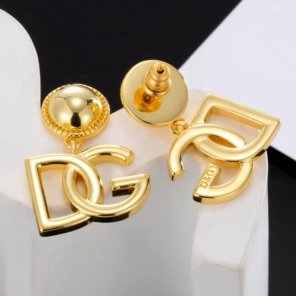 Brincos DG com 18 K de Ouro Amarelo - DG