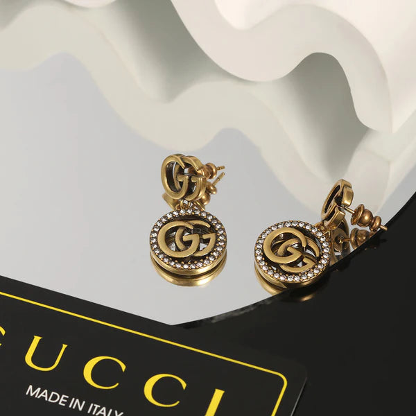 Brincos GUCCI