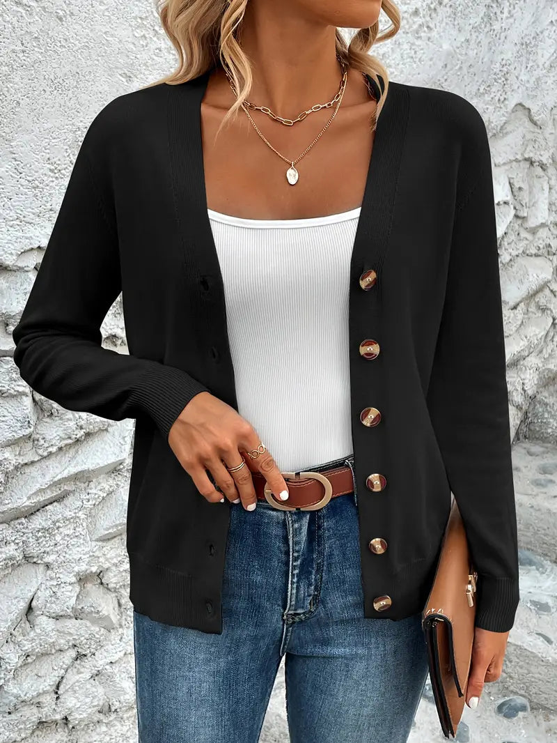 Camisola chique de cor sólida com decote em V e botão frontal