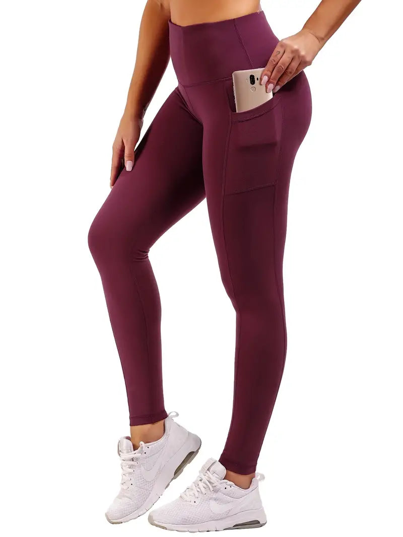 Calça colante confortáveis de cor sólida de cintura alta com bolsos para telefone