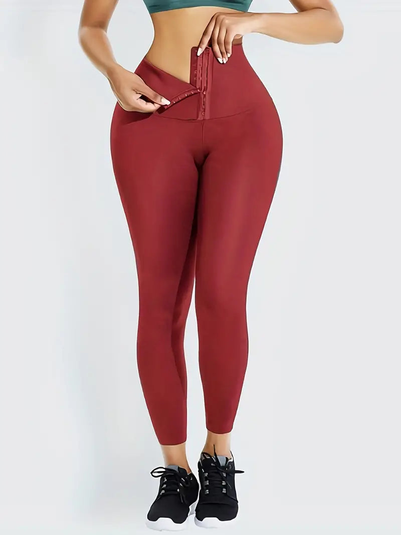 Calça colante de cintura alta com fivelas para compressão de barriga
