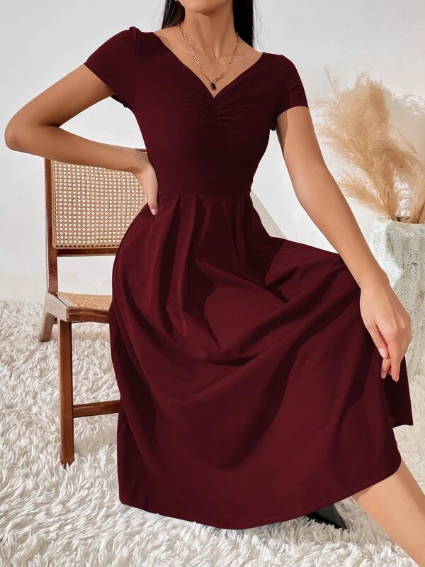 Vestido manga borboleta com bainha larga