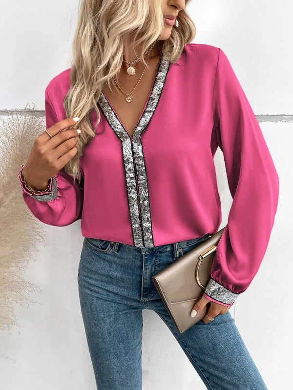 Blusa com acabamento de lantejoulas contrastante