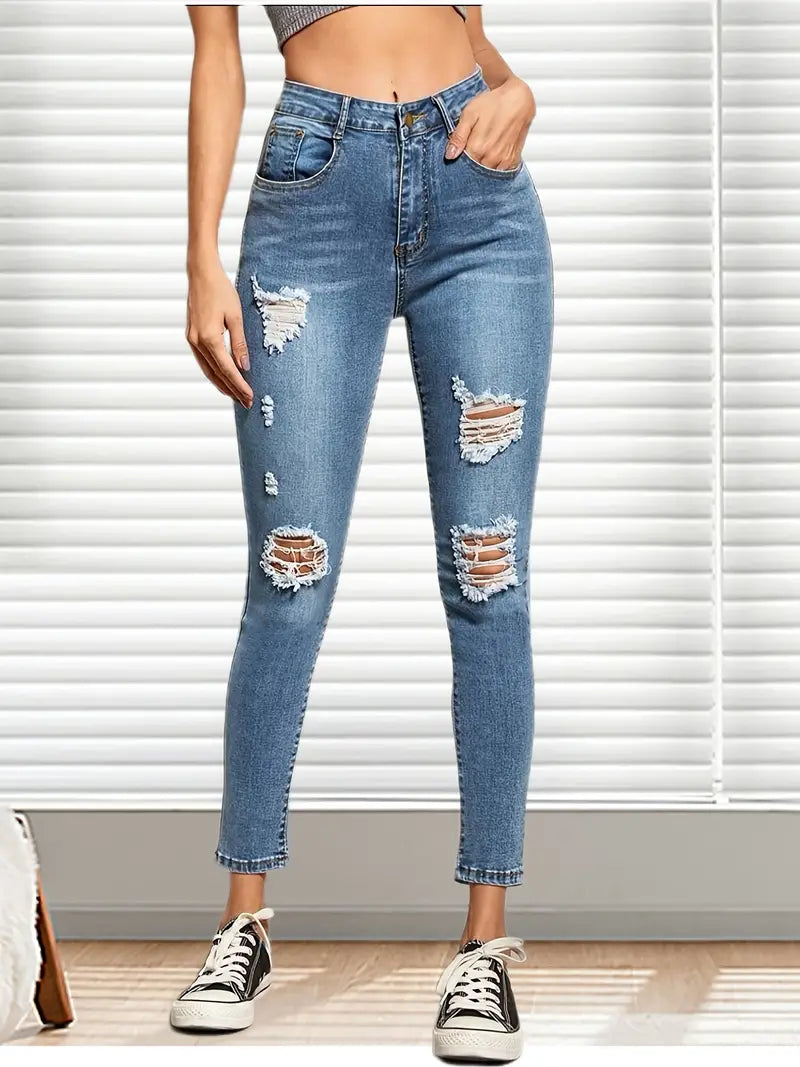 Calça jeans skinny rasgada de cintura alta