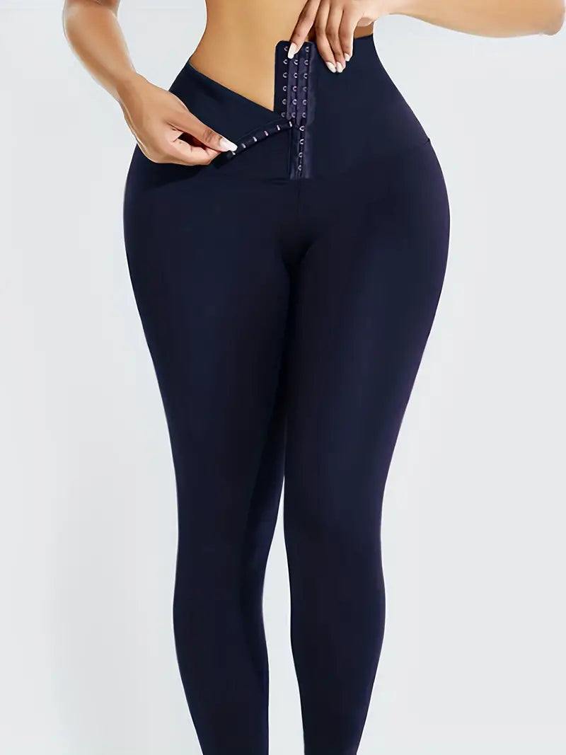 Calça colante de cintura alta com fivelas para compressão de barriga