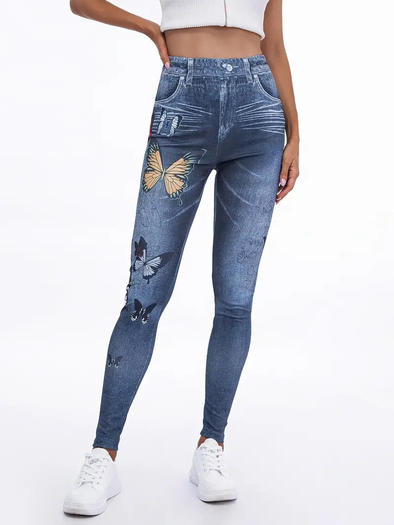 Calça colante jeans com estampas de borboleta