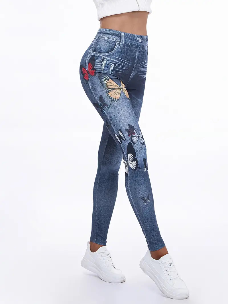 Calça colante jeans com estampas de borboleta