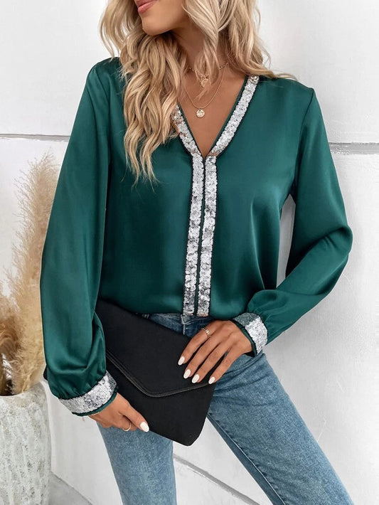 Blusa com acabamento de lantejoulas contrastante