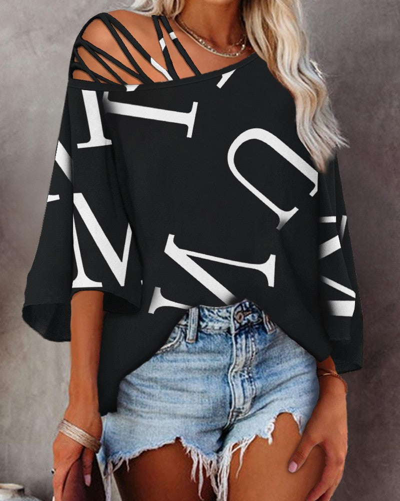 Blusa de manga boca de sino com estampa de letras